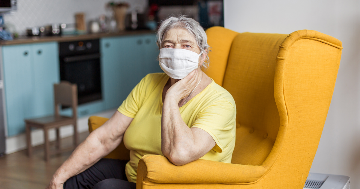 Elderly woman experiencing long covid symptoms