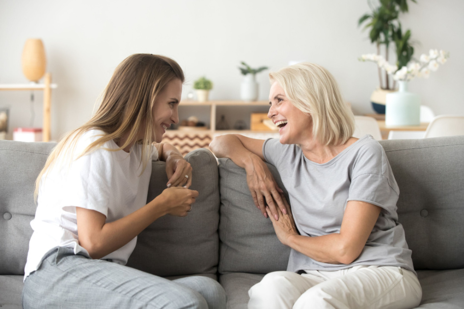 Caregiver communicating with senior