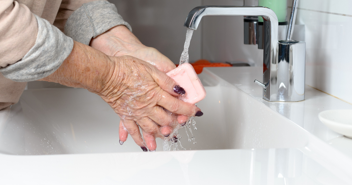 Elderly washing hands