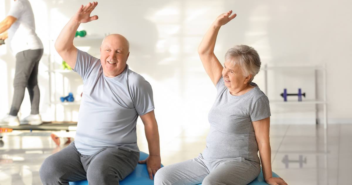 Elderly exercising to lower risk of parkinson's