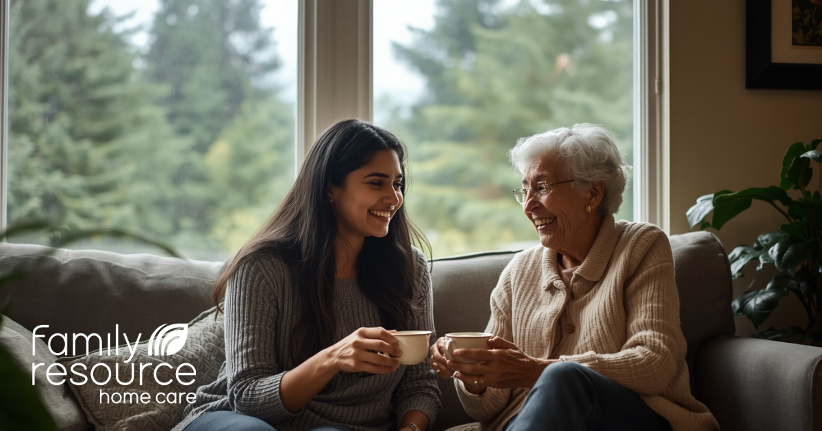 Caregiver providing in home care in Olympia WA, assisting a senior client in a cozy Pacific Northwest home in Thurston County